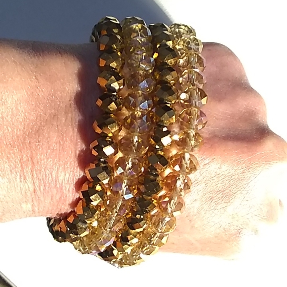 Four Strands Of Beads With Connection Bar Beads.